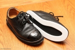 Goldline leather shoe with perimeter slider